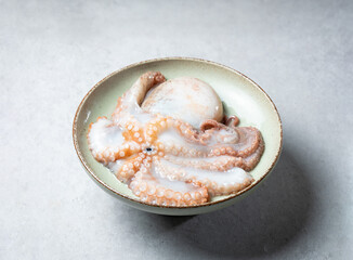 fresh raw octopus on plate