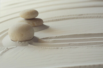 Tranquil scene of Zen stones and sand in perfect harmony