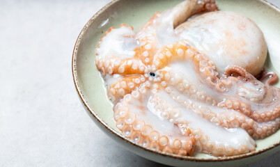fresh raw octopus on plate