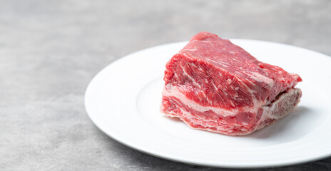 Fresh raw ribs on a plate
