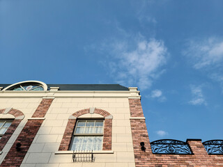 brick building with blue sky