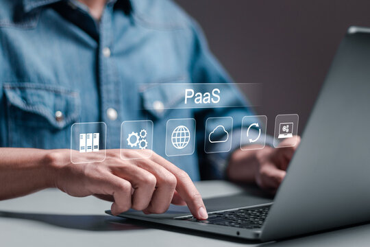 PaaS, Platform as a Service concept. Cloud computing service on software platform. Person using with PaaS icon on virtual screen.