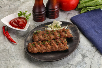 Kebab with beef served onion