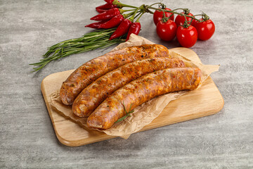 Raw sausages with spices and herbs