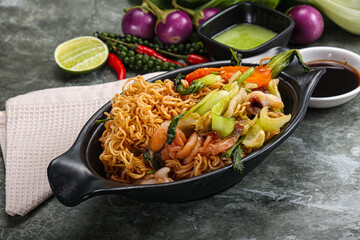 Asian cuisine - Fried noodles with seafood