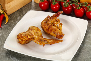 Tasty roasted chicken wing with spices