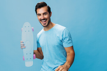 Man portrait lifestyle guy skate skater skateboard sport copy summer space studio hipster