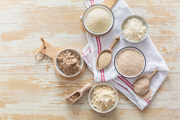 Assortment of various gluten free flour,  without carbohydrate (almond and coconut flour, psyllium husk powder, rough-ground flaxseed flour)