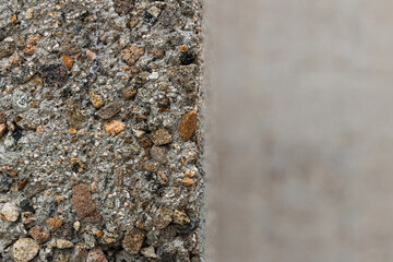 Cross section of a concrete wall. Rough texture close-up