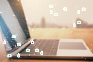 Creative concept of abstract medical illustration on modern laptop background. Medicine and healthcare concept. Multiexposure