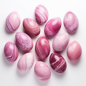 Easter eggs made of pink marble on a white background. Easter concept. top view, flat layout.