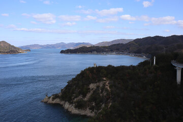 Fototapeta na wymiar しまなみ海道の灯台と入江