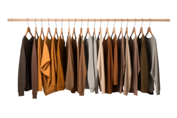 A plain clothes rack holding a neat row of various articles of clothing, including shirts, dresses, and pants. on a White or Clear Surface PNG Transparent Background.