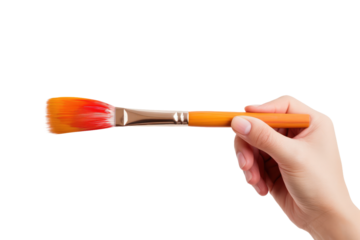 A person firmly holds a brush in their hand, ready for artistic creation. on a White or Clear Surface PNG Transparent Background.