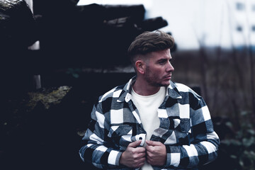 attractive young man in a denim shirt