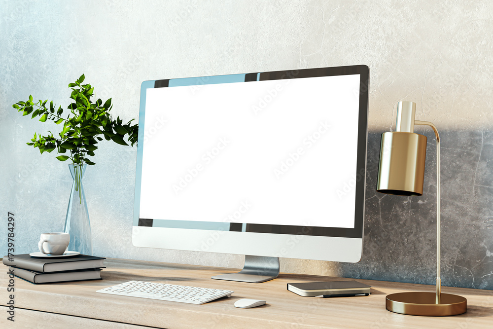 Poster bright designer desktop with empty white computer monitor, lamp, supplies and other items. concrete 