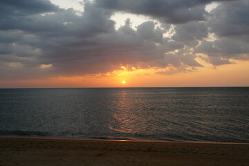 Obraz premium Sunset at Mai Kao Beach Phuket