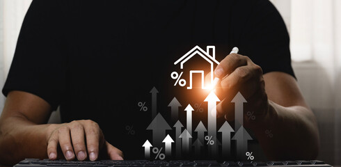 Real estate investment ideas Man using laptop touching virtual house icon to analyze home loan and...