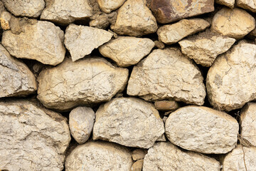 An ancient wall of stacked stone. background