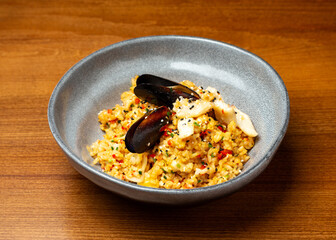 Rice with seafood in a plate.