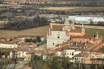 Drone shot of Certosa di Pavia cathedral a historical monumental complex that includes a monastery...