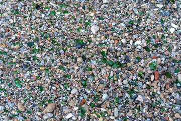 Microplastics on Sand Beach. Micro Plastics Garbage, Tiny Trash Pieces, Microplastic Waste, Dirty...