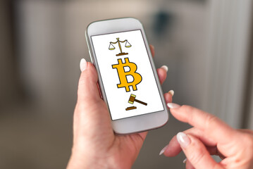 Bitcoin regulation concept on a smartphone