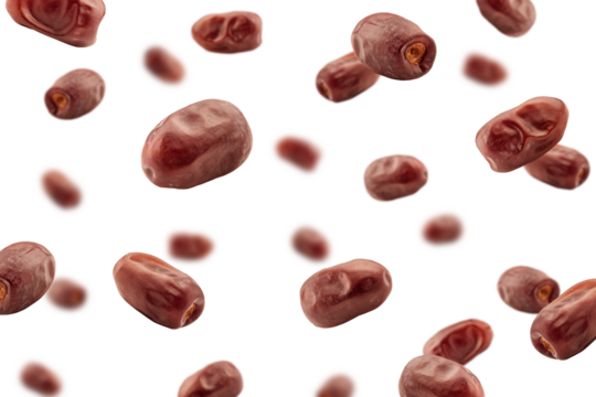 Falling Dates isolated on white background, selective focus