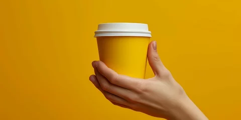 Deurstickers Coffee cup template that a person is holding, blank empty mockup, yellow soft isolated background © Gizmo