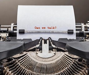 Vintage typewriter with typed text CAN WE TALK?, concept of difficult conversation, to approach for having serious talk to solve conflicts or relationship issues