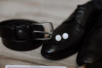 Men's accessories, groom details. Watch. Men's perfumes. Preparation for the wedding. Leather...