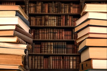 Books, notebooks lie in library background
