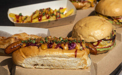 Hamburgers and French fries on the table.