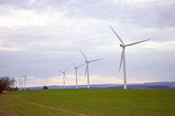 Wind turbines in a wind farm to generate clean energy. This wind farm is in Schleswig Holstein...