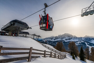 Ski Gondola lift in the Three Peaks (Drei Zinnen) ski resort in the UNESCO World Heritage site Dolomites in Italy.  - obrazy, fototapety, plakaty