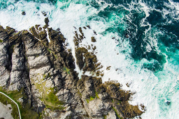 Rough and rocky shore at Malin Head, Ireland's northernmost point, Wild Atlantic Way, spectacular coastal route. Numerous Discovery Points. Co. Donegal