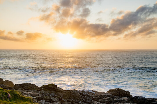Sun setting at Malin Head, Ireland's northernmost point, Wild Atlantic Way, spectacular coastal route. Numerous Discovery Points. Co. Donegal © MNStudio