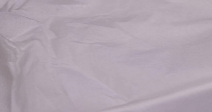 crumpled white cellulose paper in close-up, sheets of white napkins made from natural ingredients
