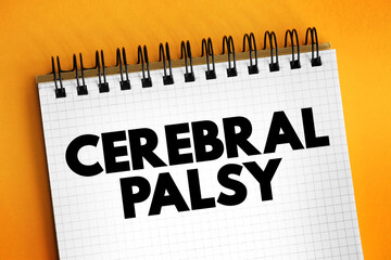 Cerebral Palsy - group of disorders that affect a person's ability to move and maintain balance and posture, text concept on notepad