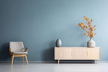 Round coffee table near the blue sofa. Wooden shelf with decoration and houseplant against blue wall with copy space. Modern living room interior design