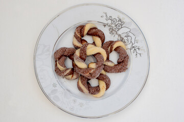 Biscuit cookies assortment on a white background, top view
