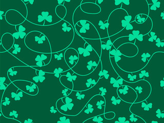 Seamless pattern of clover leaves for St. Patrick's Day. Intertwined green clover and shamrock. Irish holiday design for wallpaper, banners and promotional materials. Vector illustration