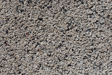 Crushed granite stones wall - close up