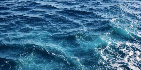 Blue sea water texture. Water splashing in the deep sea. - obrazy, fototapety, plakaty