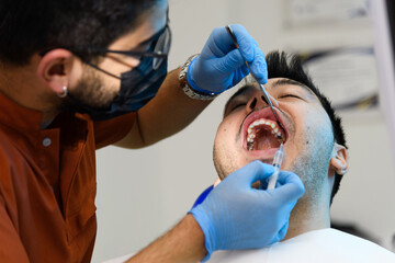 Dental whitening procedure in progress