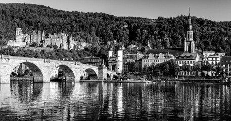 Panorama of Heidelberg old town with castle and baroque Karl Theodor Bridge and its twin tower...