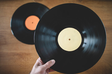 DJ holding long play vinyl record