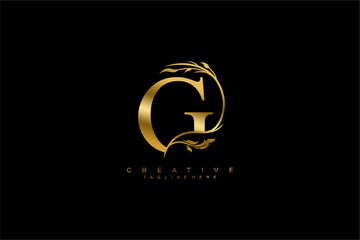 Obraz premium luxury gold letter G logo design with beautiful flower and leaf ornaments. monogram G, logo typography. initials G. typography. for business logos, boutiques, companies, beauty, etc