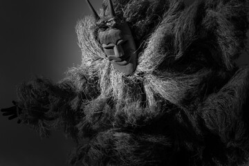 The Lazarim Carnival Masks, an ancient tradition, a man wear the skin of the devil during the...