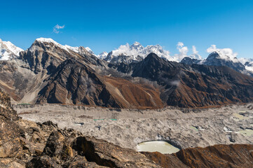View of snow capped Kangchung, Pumori, Everest, Nuptse, Lhotse, Lobuche, Makalu, Cholatse, Taboche of the Himalayas and Ngozumpa Glacier. View from Gokyo Ri, Solukhumbu, Sagarmatha, Nepal.